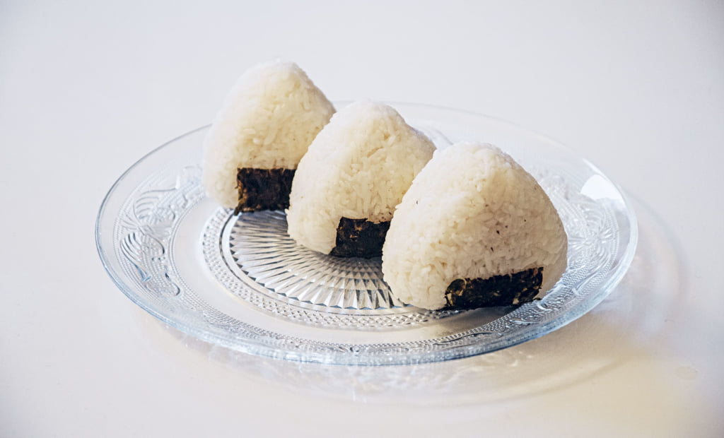 Japanese Rice Ball or Onigiri, Omusubi, Nigirimeshi in Plastic Package Like  Anime Food Style. Isolated Onigiri on White Background Stock Illustration -  Illustration of balls, lunch: 219266681